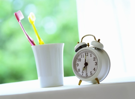 Toothbrush and alarm clockの写真素材