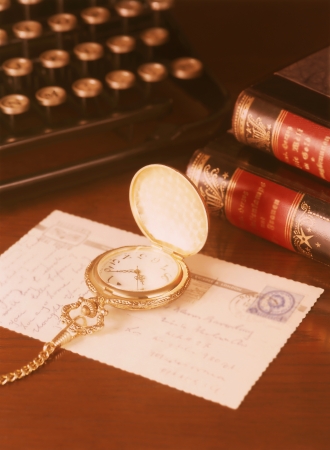pocket watch and typewriterの写真素材