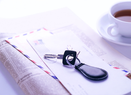 key and newspaperの写真素材