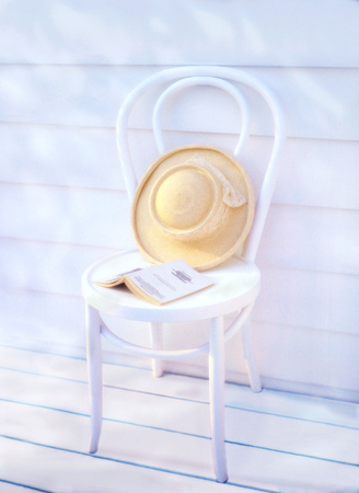 straw hat and bookの写真素材