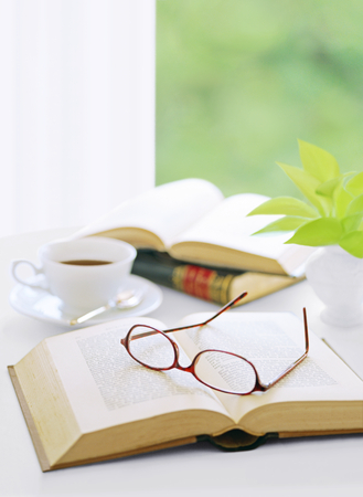 book and glasses  and coffeeの写真素材