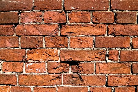 Red brick wall with the damagedの写真素材