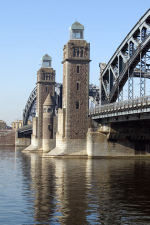 Towers of  Big Ohta bridge (Peter The Great bridge) through Neva river in St. Petersburg, Russia (1909)の写真素材