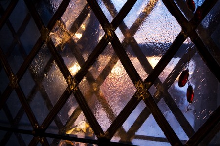 Medieval window in winter evening, Tallinn, Estonia, Christmas timeの写真素材