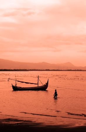Evening on the beach, sunset, island Java, Indonesiaの写真素材