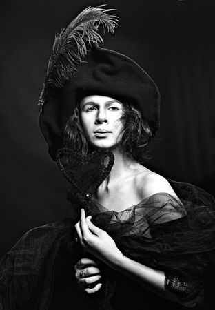 Portrait of high society medieval lady in hat, studio retro stilization, monochromeの写真素材