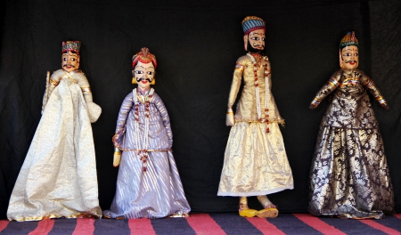 Four India puppets on black backgroundの写真素材