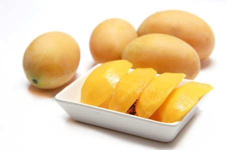 Marian plum fruit and slide on white backgroundの写真素材