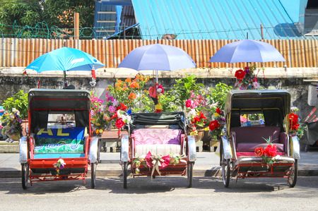 GEORGE TOWN MALAYSIA   05 JUNE 2015:  Three old traditional trishaws in Georgetown Penang Malaysia.のeditorial素材