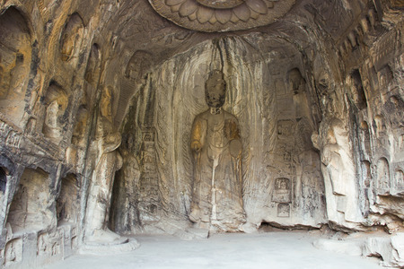 Budha's rock statue at Longmen Grottoes, Luoyang, Henan, Chinaのeditorial素材