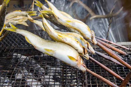 Charcoal grilled fish Japanese street food.の写真素材