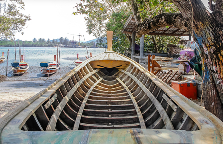 Inside boat structure made from wood on beachの写真素材