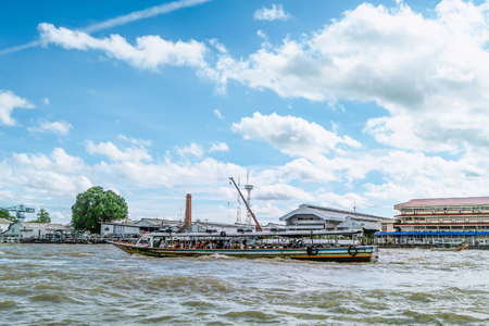 BANGKOK, THAILAND-7 July 2017,: The tourists  travel Chao Phraya River by motor boat in Bangkok on cloudy dayのeditorial素材
