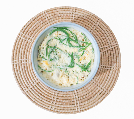 Steamed eggs with acacia pennata on white backgroundの写真素材