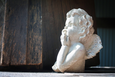 Angle sculpture decorated in the garden with sun lightのeditorial素材