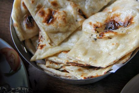 Butter naan, Indian nan bread in dark tone