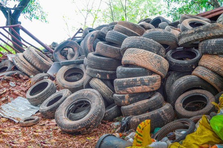 Pile used car tires for recyclingの写真素材