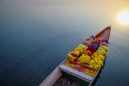 Flowers on boat at floating market, left space for textの写真素材