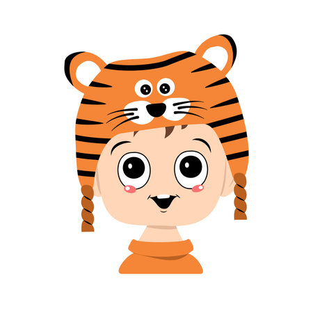 Avatar of a child with big eyes and a wide smile in a tiger hat. Cute kid with a joyful face in a festive costume for new year and Christmas. Head of adorable baby with happy emotionsのイラスト素材