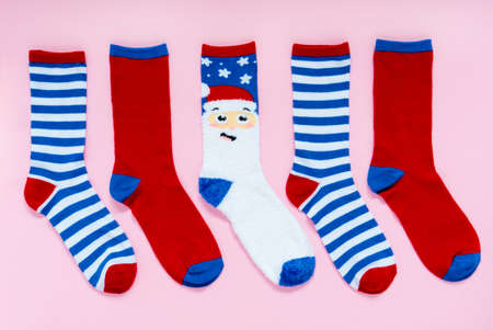 New Years socks on a pink background. Christmas. Top viewの写真素材