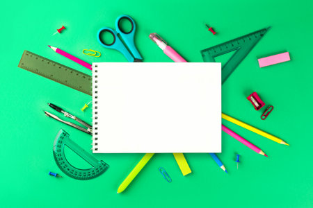 Flat lay composition with school supplies. composition with colorful stationery and whitenotebook, copy space. Back top school concept. Top view, overhead.の写真素材