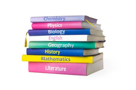 School colourfull textbooks isolated on white background. Basic school subjects mathematics, literature, physic,s chemistryの写真素材