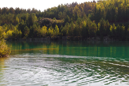 Landscape with marble lake, summer or autumn viewの写真素材