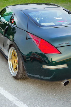 07/27/2024 Novosibirsk, Meet, Green Nissan 350 Z, Fairlady Z back view. Lowrider custom stance, rims...