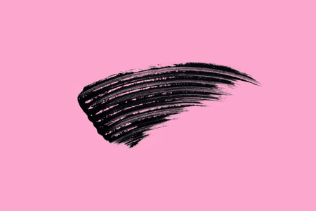 Swatch, beautiful mascara brushstroke smear isolated on pink background flat layの写真素材