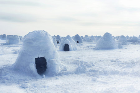 Igloo holiday. Dwelling made of ice and snow. Lots of igloo built
