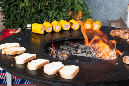 delicious beef steaks on the grill with flamesの写真素材