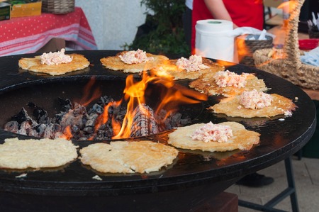 streetfood delicious draniki cook on charcoalの写真素材
