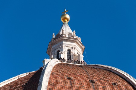 Dome of the Cathedral Santa Maria del Fiore on a sunny day against the blue sky, observation deck, Florence, Italyの写真素材