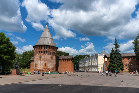 Smolensk, Russia - June 11, 2018: Oktyabrskaya street ,The tower of thunder of the fortress wall and...