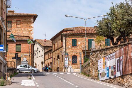 San Quirico d'Orcia, Italy - April 24, 2018: Street view of San Quirico d'Orcia. A small typical town in Italy. Typical Italian street in a small provincial town of Tuscan, Italy.のeditorial素材