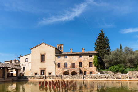Bagno Vignoni, Italy - April 26, 2018: The ancient village of Bagno Vignoni in the Val dOrcia in Tuscany, Italy.のeditorial素材