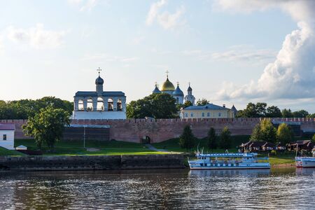 Veliky Novgorod, Russia - August 31, 2018: Panoramic view of the Kremlin, Cathedral of St Sophia , The belfry of St. Sophia Cathedral, Nizhny Novgorod, Russia. Volkhov River and cruise ships with tourists.のeditorial素材