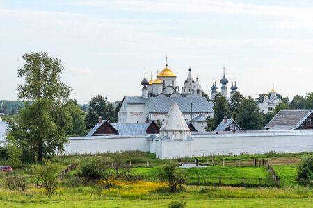 Picturesque summer view of medieval Intercession (Pokrovsky) Monastery in Suzdal.The Golden Ring of Russia. Scenic panoramic view of Intercession Convent in Suzdal.の写真素材