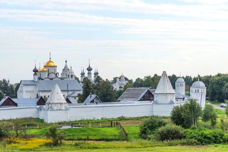 Picturesque summer view of medieval Intercession (Pokrovsky) Monastery in Suzdal.The Golden Ring of Russia. Scenic panoramic view of Intercession Convent in Suzdal.の写真素材