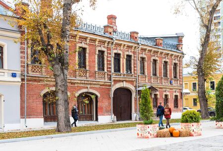 Moscow, Russia - October, 5 2019: Shkolnaya street during the festival Golden Autumn in Moscow. Shkolnaya street in the center of Moscow after reconstruction. Facade of an old house after reconstruction.のeditorial素材
