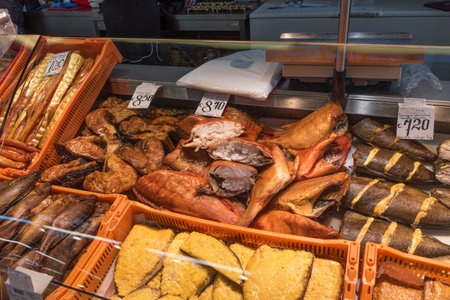 Riga, Latvia - October 28, 2019: Fresh fish at Riga Central Market. Smoked and salted fish at the...