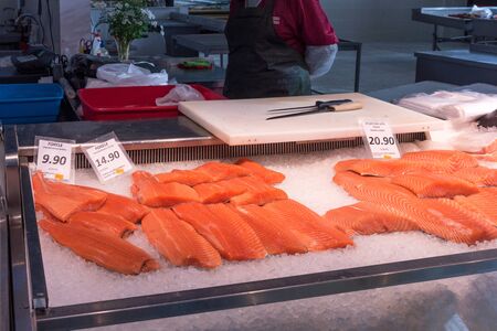 Riga, Latvia - October 28, 2019: Fresh fish at Riga Central Market. Salmon and trout on ice at the fish market in Riga, Latviaのeditorial素材