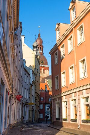 Riga, Latvia - October 28, 2019: Picturesque view of medieval street with Riga Cathedral in Riga, Latvia.のeditorial素材