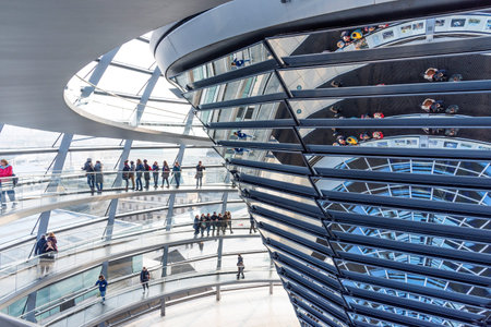 BERLIN, GERMANY - November 23, 2019: Interior of The Reichstag dome. People visit the Reichstag dome...