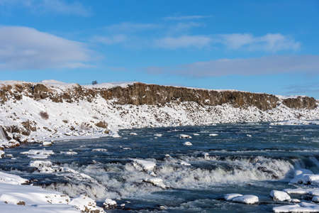 Amazing aereal winter landscape view of Urridafoss waterfall in Iceland.の写真素材