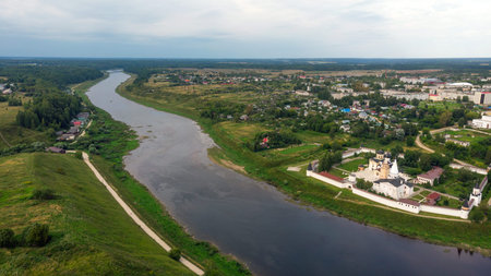 Scenic summer view of Staritskiy Holy Dormition Monastery on the Volga River in Staritsa, Russia.