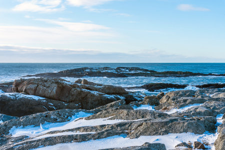 Aerial winter landscape view of Black sand beach on the Stokksnes peninsula in Southeast Iceland.