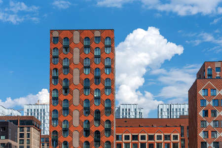 Moscow, Russia - June 14, 2021: The facade of a new modern house in the residential complex Zilart. New building in the southern district of Moscow.のeditorial素材