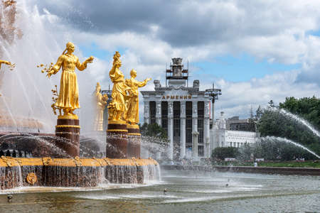 Moscow, Russia - june 30, 2021: The Friendship of Nations fountain, the main fountain and one of the main symbols VDNH in Moscow. Fountain with golden statues.のeditorial素材