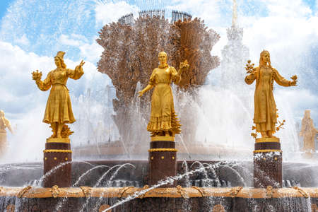 Moscow, Russia - june 30, 2021: The Friendship of Nations fountain, the main fountain and one of the main symbols VDNH in Moscow. Fountain with golden statues.のeditorial素材